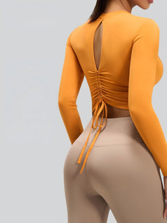 Pleated Figure-Hugging Sports Top With Built-in Bra