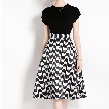 Women's Knitted Short Sleeved Top and Water Wave Pattern Waistband Skirt