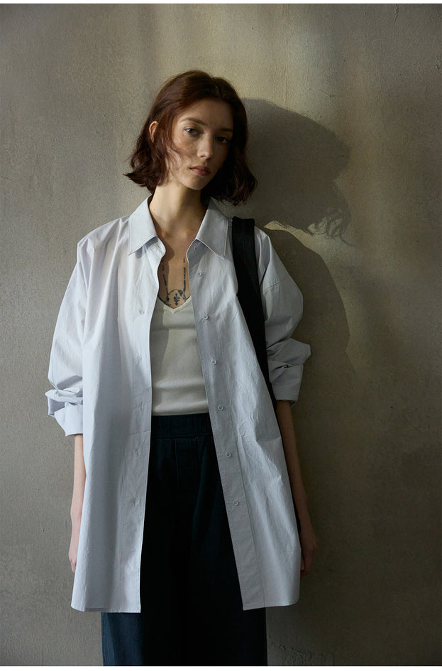 A Loose And Fashionable Button Mid-length Sleeved cotton Commuting Blouse