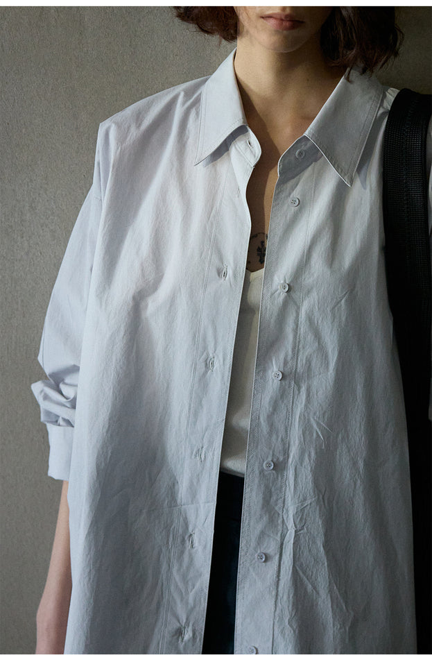 A Loose And Fashionable Button Mid-length Sleeved cotton Commuting Blouse
