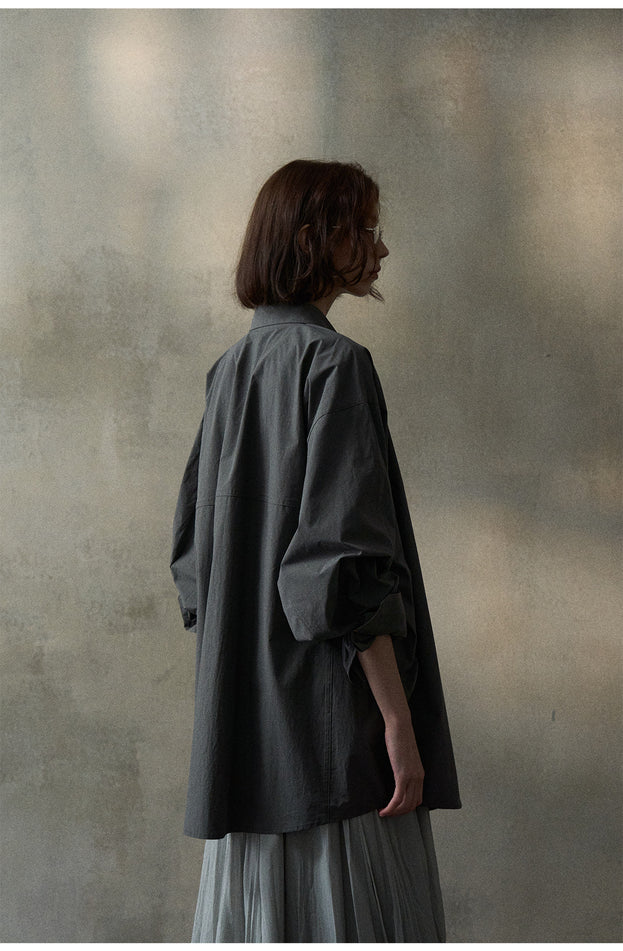 A Loose And Fashionable Button Mid-length Sleeved cotton Commuting Blouse